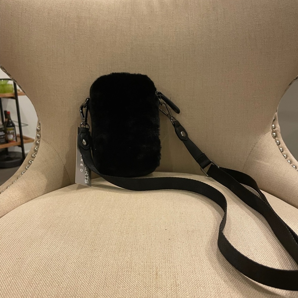Sondra Roberts- black faux fur phone cross body